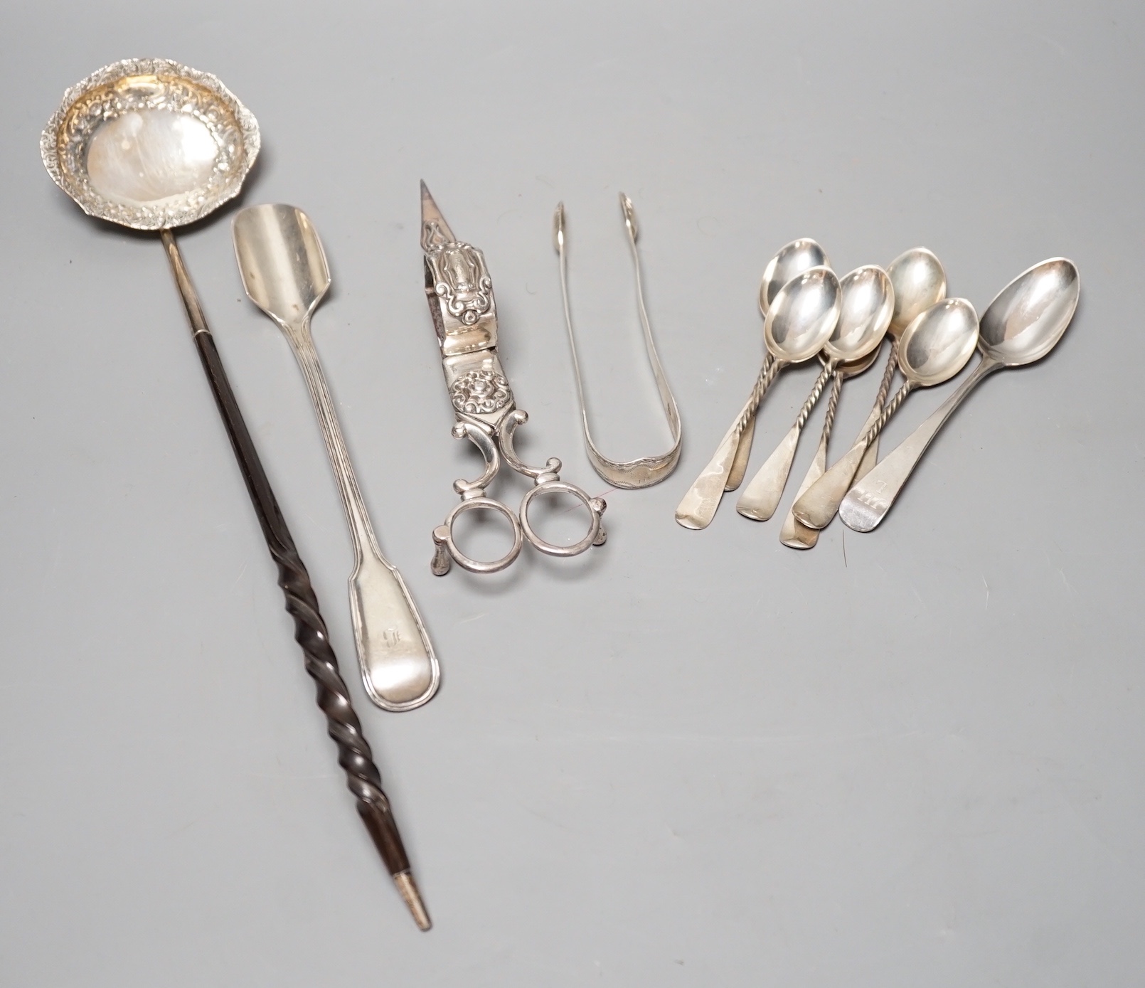 A Victorian silver fiddle and thread pattern stilton scoop, George Adams, London, 1852, 22.3cm, a small group of silver flatware and a plated toddy ladle and pair of candle snuffers.